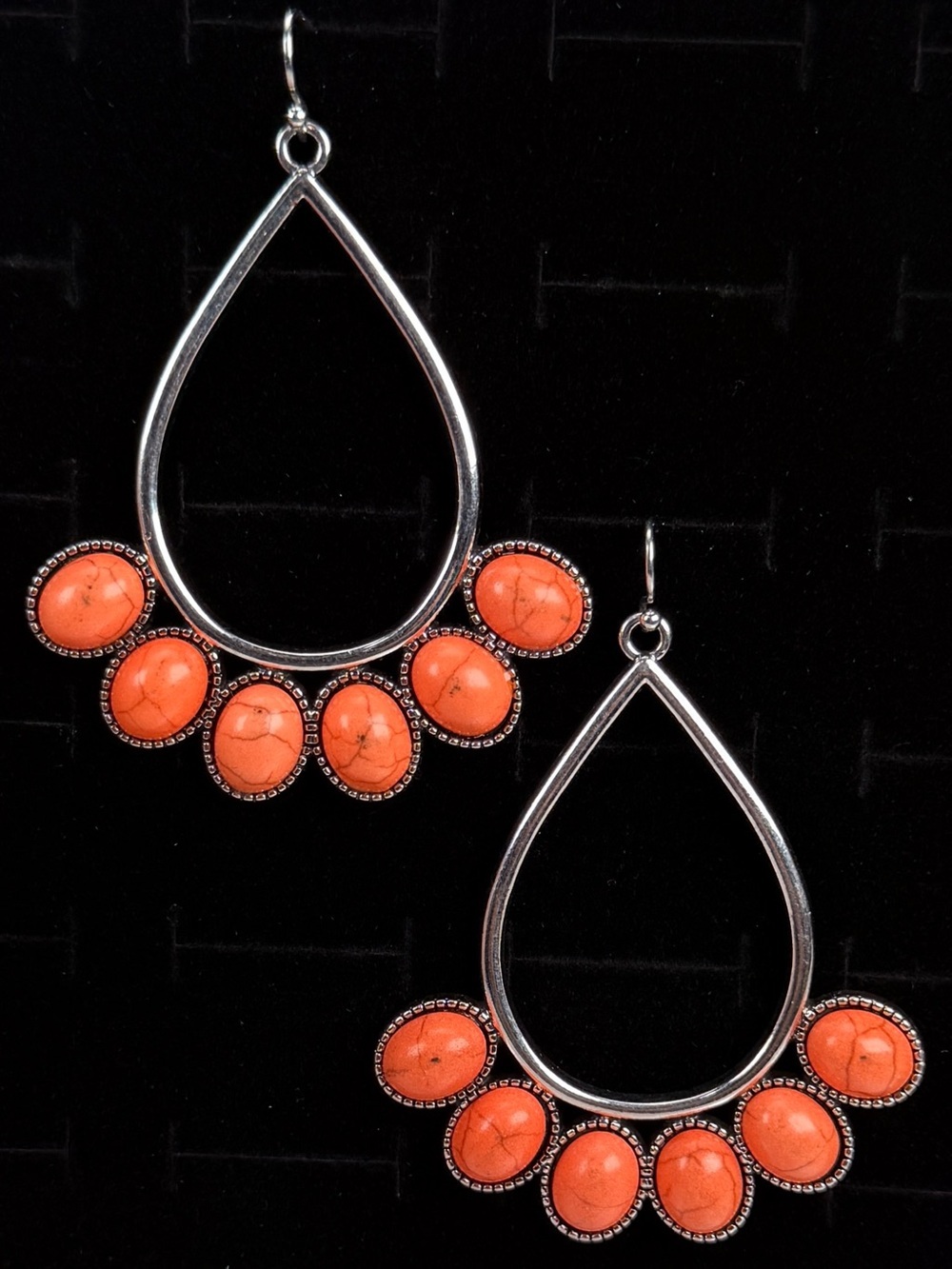 Gorgeous Silvertone and orange weighted costume pierced earrings